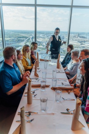 a group of people sitting at a table