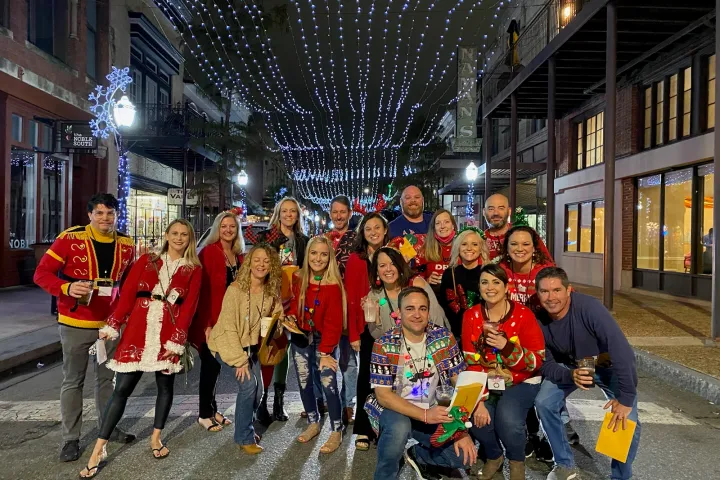 a group of people posing for the camera