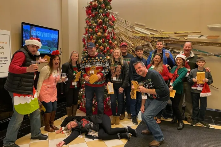 a group of people standing in a room