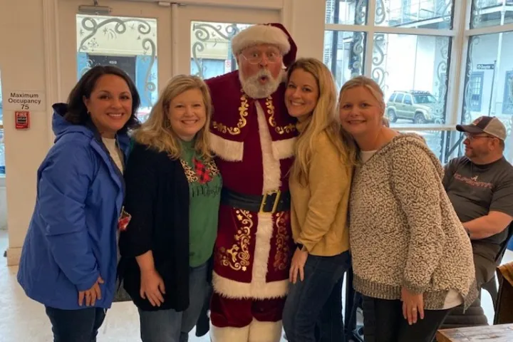 a group of people posing for the camera