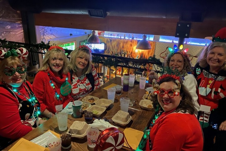 a group of people posing for the camera