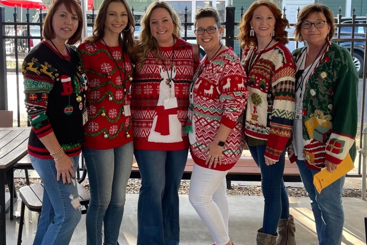 a group of people posing for the camera