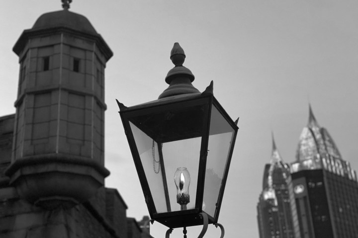 a large tall tower with a clock at the top of a building