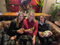 a group of people sitting posing for the camera