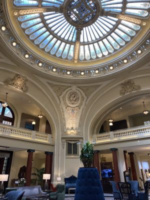a large building with a clock in the middle of a room