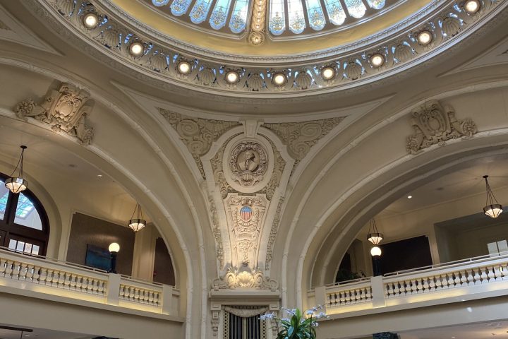 a large building with a clock in the middle of a room