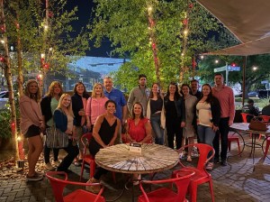 a group of people standing in front of a crowd