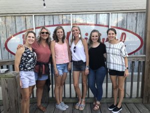a group of people posing for a photo