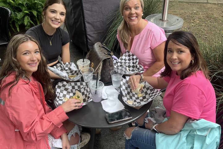 a group of people posing for a photo