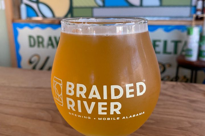 a glass of beer on a table
